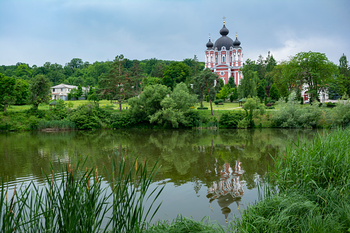 Beautiful view of Curchi Monastery and lake with reflections, Moldova