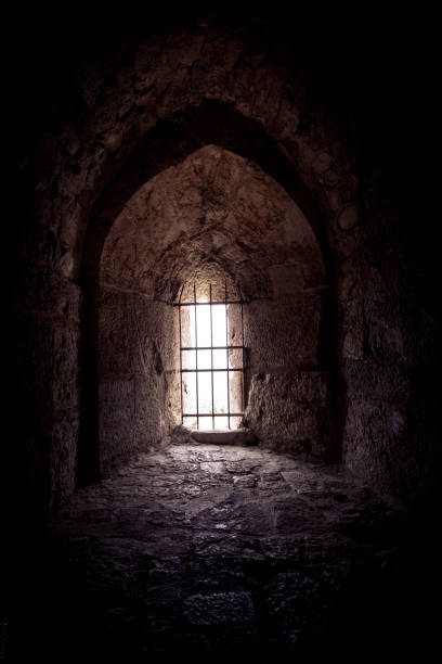 window with bars window with bars of an old prison prison escape stock pictures, royalty-free photos & images