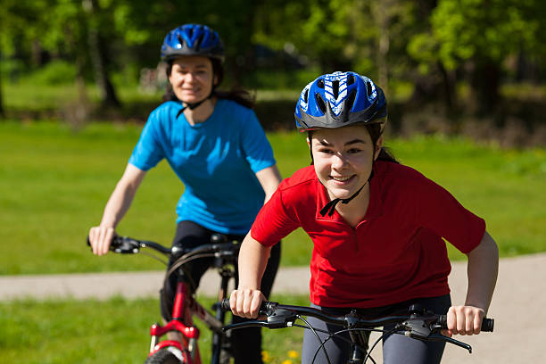 istock Girls biking 151936928