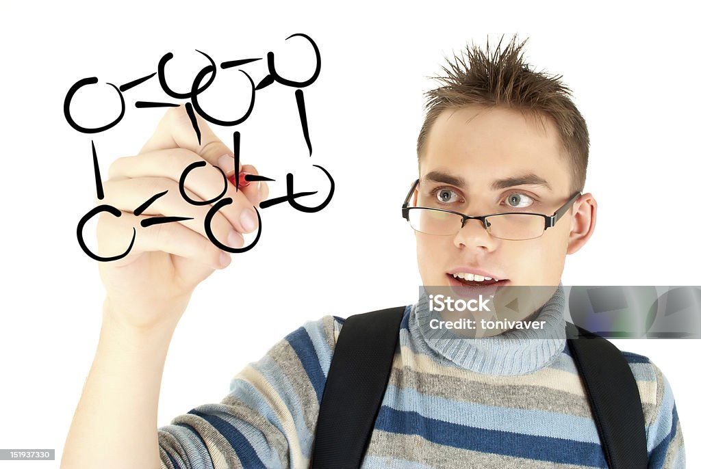 Student writing scientific formula Student writing scientific formula on the whiteboard Drawing - Activity Stock Photo