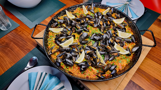Paella served in paella pan - ready to eat.