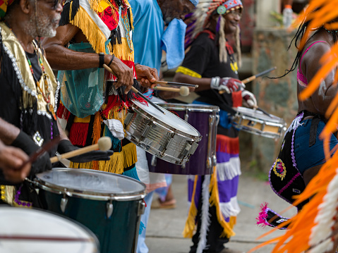 Cruz Bay, St John/US Virgin Islands-July 04, 2023: Fourth of July Carnival celebration in Cruz Bay, Tribal drummers drumming in the street