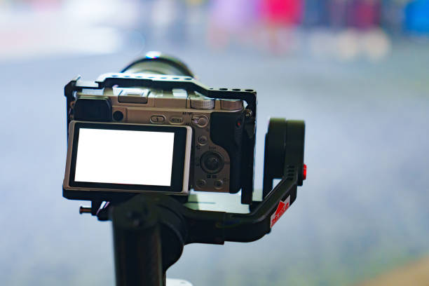 istock white screen video camera. shooting a video at a celebration or concert. 1519438490