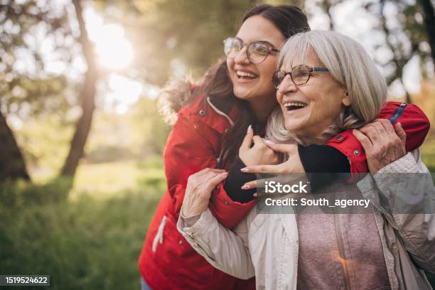 Young Woman With Grandmother In Nature Stock Photo - Download Image Now - Senior Adult, Family, Grandparent