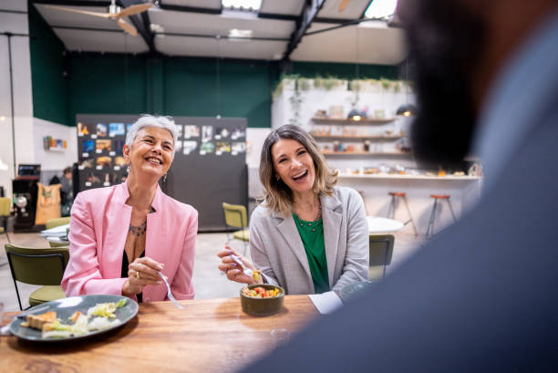 istock Coworkers talking while eating at a restaurant 1519550952