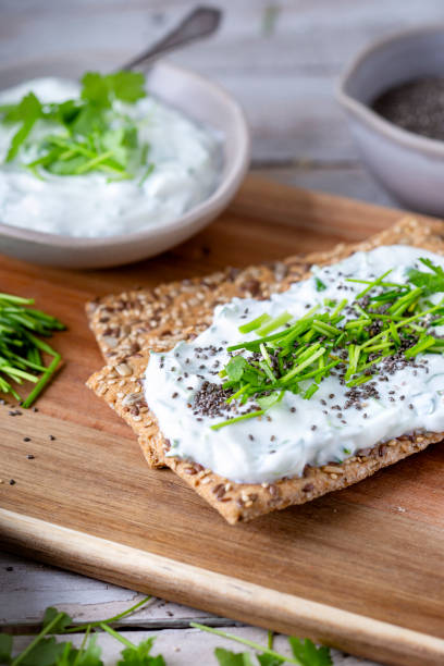 istock Crispbread, fresh curd, herbs and chia seeds 1519568631