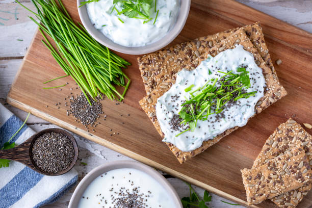 istock Crispbread, fresh curd, herbs and chia seeds 1519568656