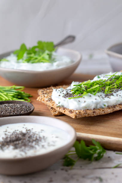 istock Crispbread, fresh curd, herbs and chia seeds 1519568902