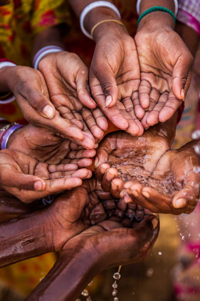 istock Poor Indian children asking for fresh water, India 1519571338