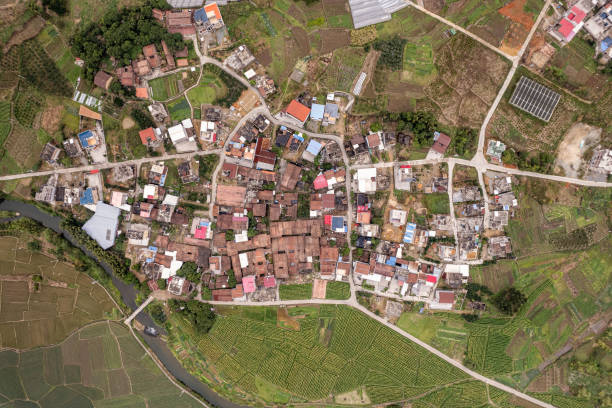 istock Bird's view of rural fields and houses 1519576710