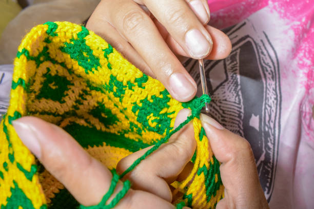 istock Crochet with green and yellow crochet thread. 1519594675