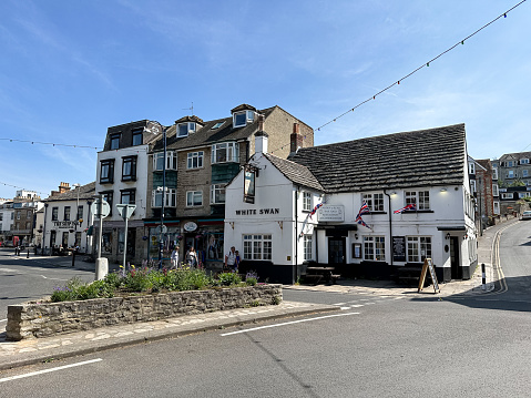 Shops, cafes, bars, pubs along the high street in Swanage, Dorset, England, UK