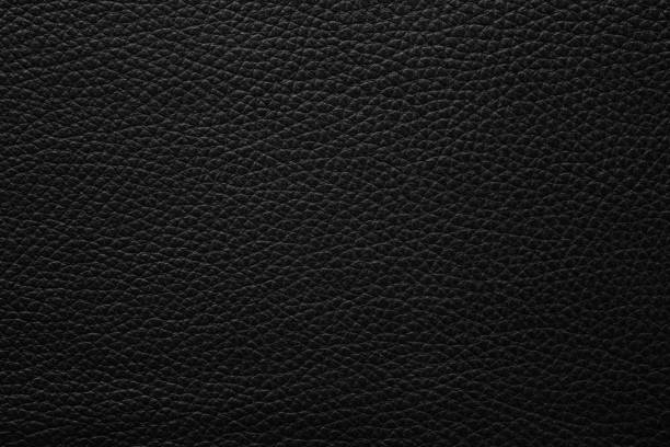 istock black leather texture, cowhide as background for textile design 1519613777