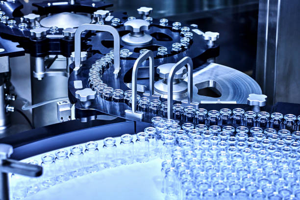 Group of Glass Bottles at Production Line stock photo