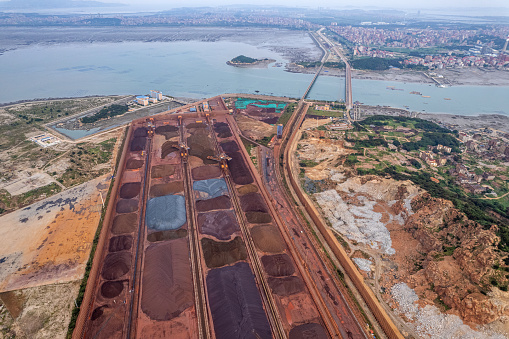 Aerial view of metal raw materials stacked at the freight terminal