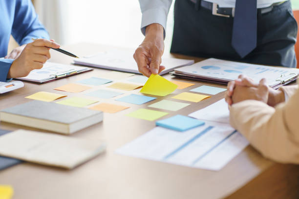 istock Business People brainstorming Meeting Design Ideas use post it notes to share idea professional investor start up project business brainstorming planning in office 1519621593