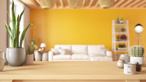 istock Focus on Wood Table Top on Blur Living Room 1519647072