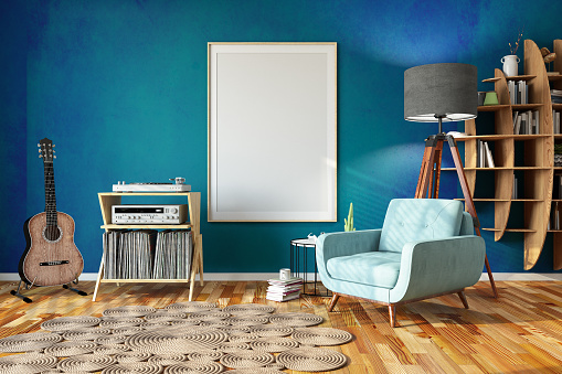 Interior with Blue Wall Armchairs Coffee Table and Empty Picture Frame. 3D Render