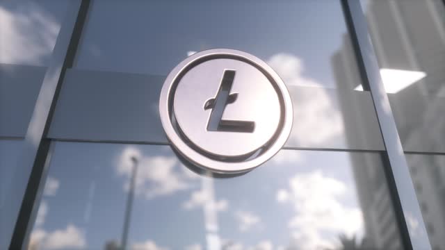 Litecoin currency symbol on a modern glass skyscraper. Mining crypto currency concept