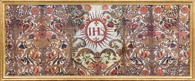 Luzern - The painted baroque side altar with the IHS initials in the Jesuitenkirche from 17. cent.