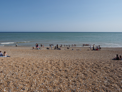 Eastbourne, Sussex, England, UK - Aug 30, 2019: Tourists and visitors were attracted to Eastbourne Pier by the beautiful spring weekend weather, Eastbourne, East Sussex