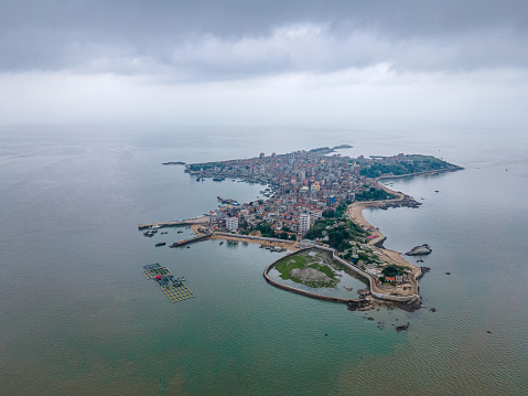 Island and Wind Power on a Cloudy Day