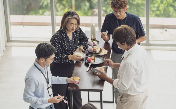 istock Business People Having a snack and dessert during the break 1519720077