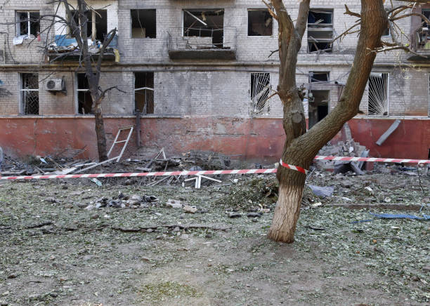 destroyed apartment building after rocket attack. traces of fragments. - donetsk stok fotoğraflar ve resimler