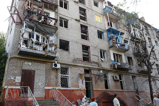 Destroyed apartment building after rocket attack.