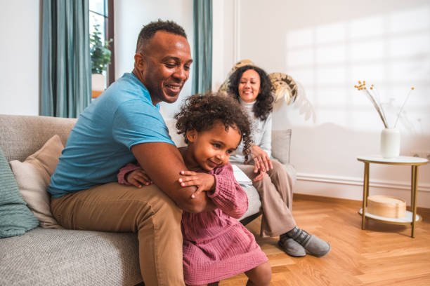 istock Hispanic Male And Little Daughter Bonding While Playing At Home 1519750866