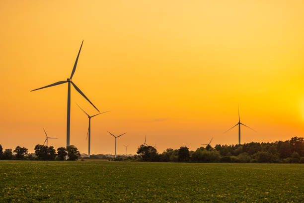 istock power generating wind turbine at sunset 1519779147