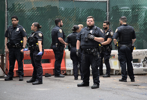 New York, NY - June 24, 2023: NYPD police officers responding to incident on St. Mark's Place btwn 2nd and 3rd avenues in East Village, Manhattan.