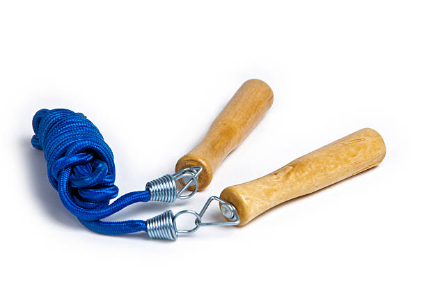 istock blue Skipping rope with wooden handle 151980125