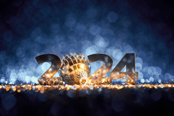 Bodegón navideño de Año Nuevo 2024 - Fondo Celebración de la fiesta disco Gold Blue - foto de stock