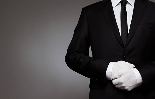 At Your service Well dressed man waiting for orders with copy space formal glove stock pictures, royalty-free photos & images