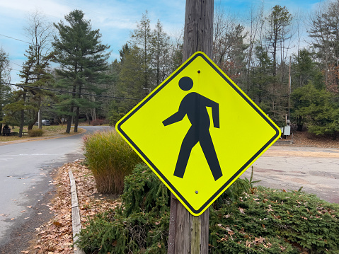 Pedestrian crossing sign in a park