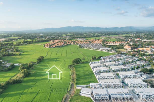 istock Green fields and dream house in aerial view. 1519943712