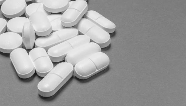 istock medical pills on black and white background 1519945299