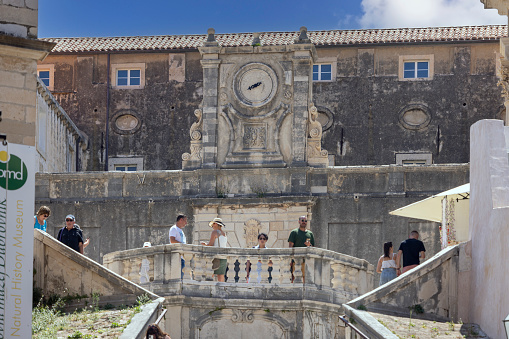 Dubrovnik, Croatia - June 27, 2023: Baroque Jesuit Stairs leading to the entrance gate to Jesuit Church of St. Ignatius of Loyola and Jesuit college. This is a place famous for filming the series Game of Thrones