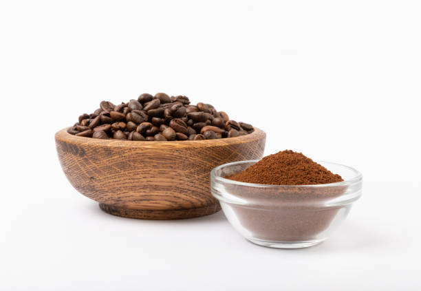 istock Ground coffee and coffee beans isolated on white background. 1519957922