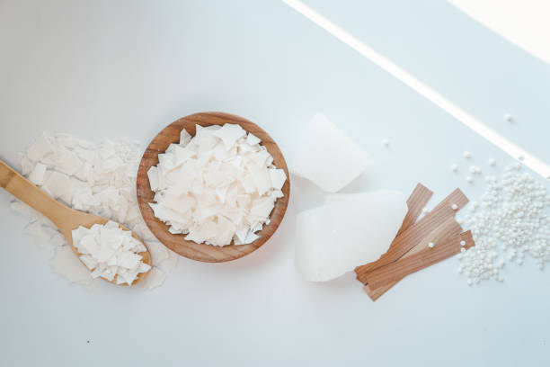 istock Set for crafting candle on white background. Eco soy wax and candle making tools top view, flat lay. DIY candles. Hobby concept 1519962762