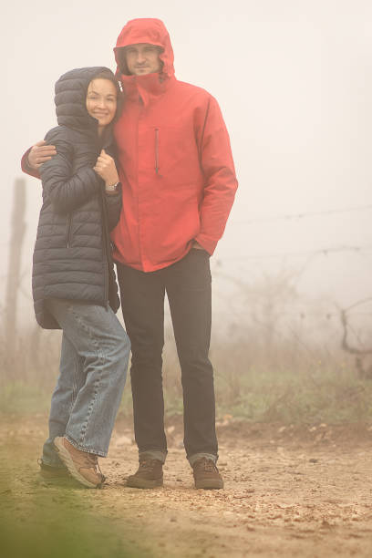 spouses in the fog - vacations women men stability imagens e fotografias de stock