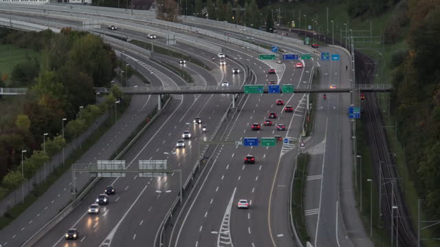 evening time zurich city district traffic road highway aerial topdown panorama 4k switzerland