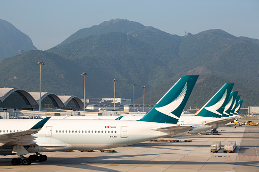 A group of Cathay Pacific Airways aircrafts parked at Hong Kong International Airport in April 2023.