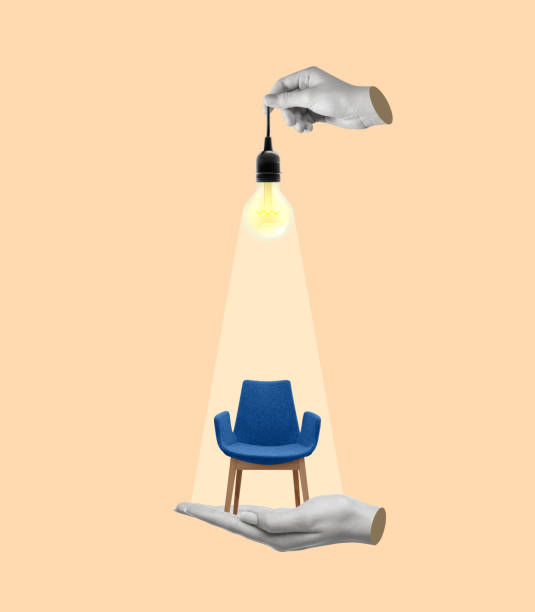 istock A hand holds a light bulb on an office chair. 1520012510