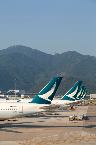 A group of Cathay Pacific Airways aircrafts parked at Hong Kong International Airport in April 2023.