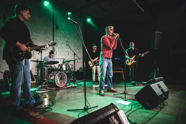 istock Punk rock music band group live performance on stage 1520022420