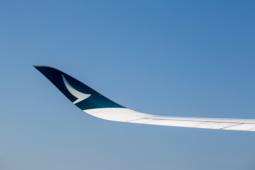 Wing tip of Cathay Pacific Airways Airbus A350-1041 aircraft in mid-air in April 2023.