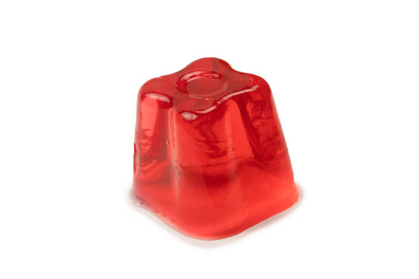 istock Sweet fruit jelly dessert isolated on white background. 1520066314