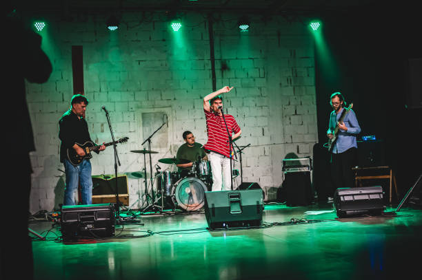 istock Punk rock music band group live performance on stage 1520210809